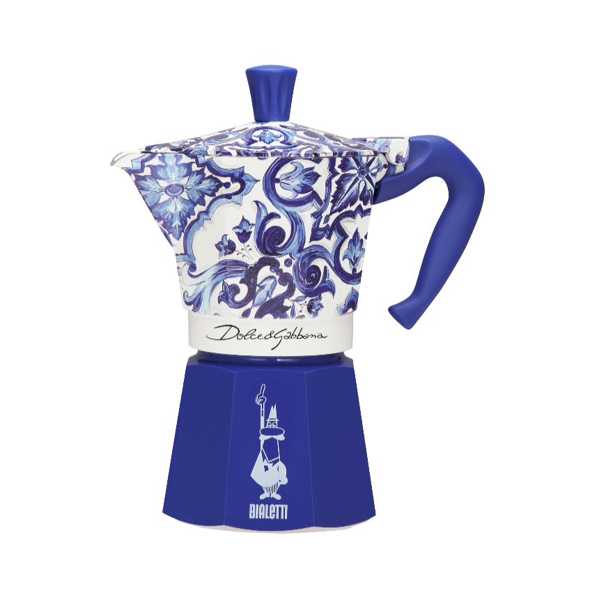 Bialetti Dolce & Gabbana Mediterranean Blue Moka Pot on gas stovetop in contemporary kitchen – fusion of art and coffee tradition