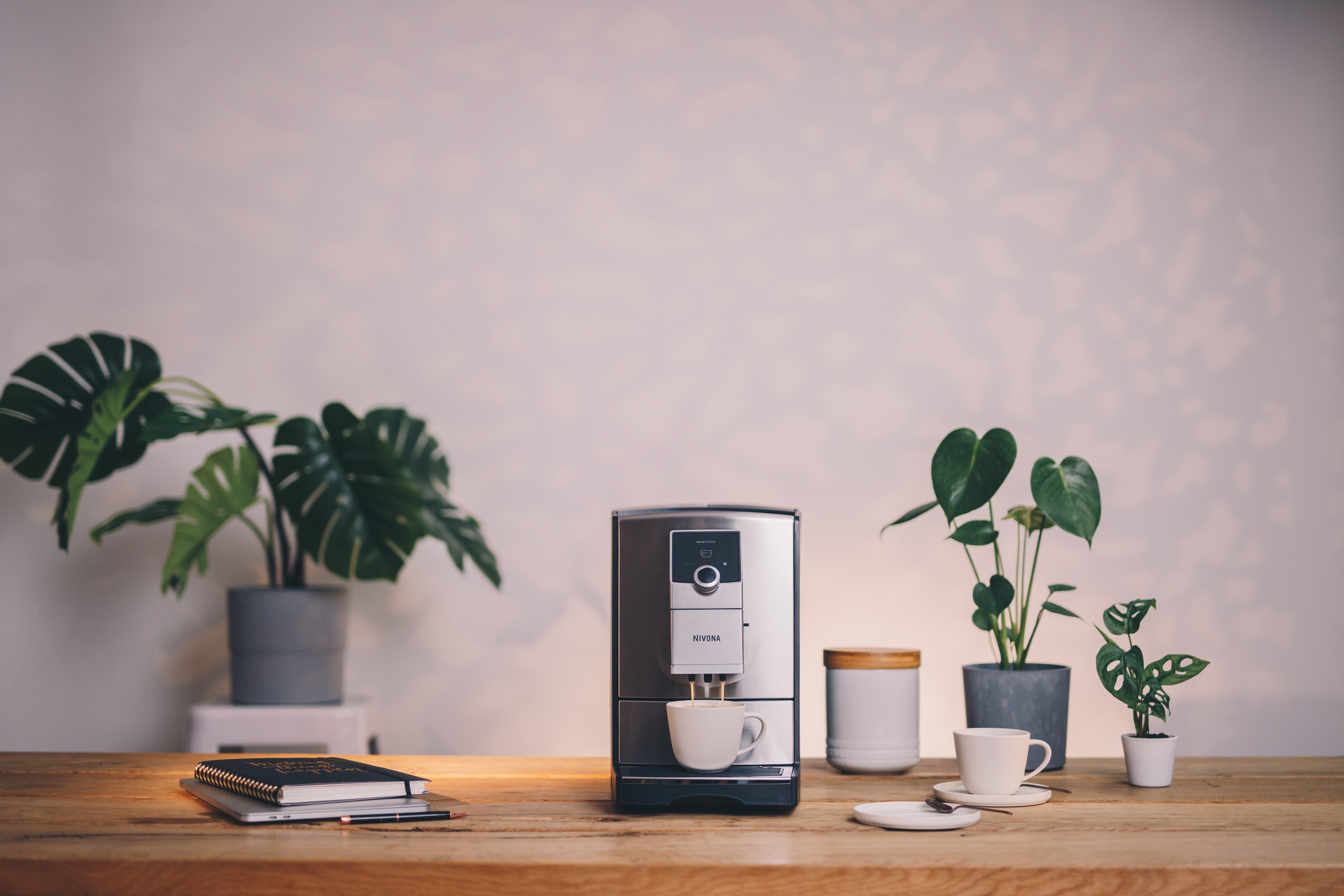 Close-up of Nivona NICR 799's OneTouch SPUMATORE milk frothing system for creamy milk foam