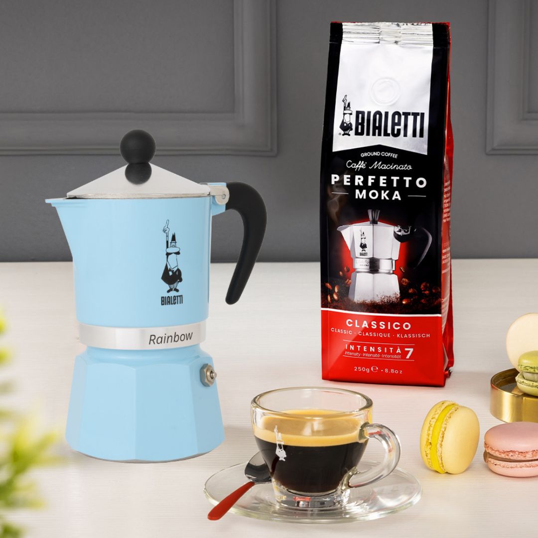 Top view of Bialetti Rainbow Blue Moka Pot featuring silver lid with black knob for easy opening​