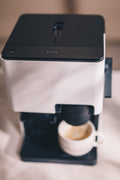 Top view of Nivona CUBE 4102 featuring 250g bean hopper and 1.4L removable water tank